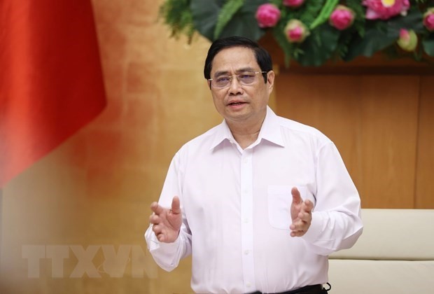 越南政府总理范明政：认真、科学研究 安全适应新冠肺炎疫情
